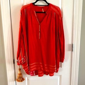 Free People size L, red, black, and white with gold accent in checker pattern.